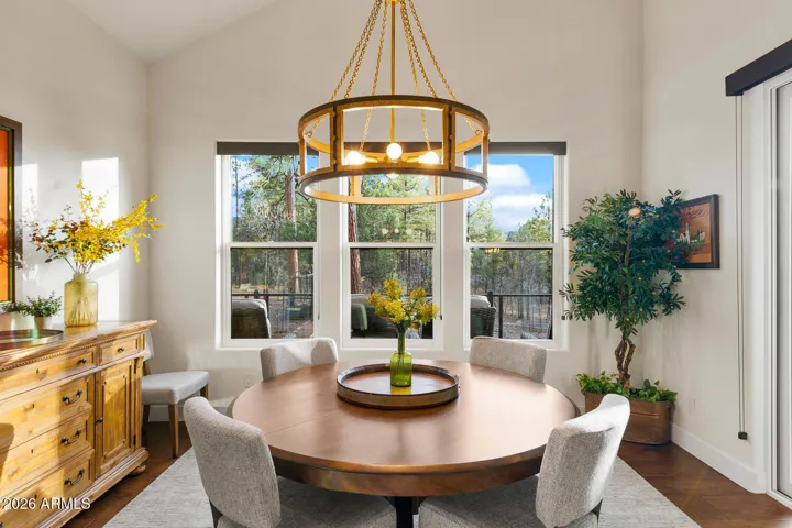 Dining room with a view of the trees.