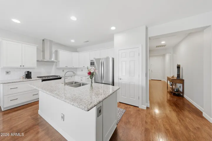 Note the beautiful laminate wood floor - throughout! (tile in bathrooms/laundry)