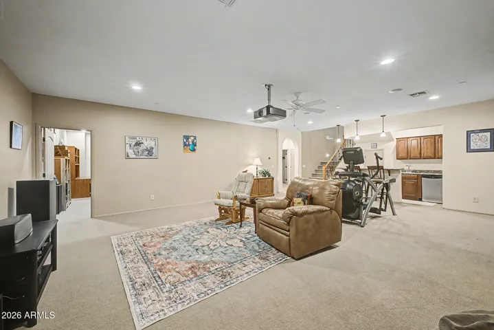 This flexible lower level is ideal for lively game-day parties, cozy movie nights, or welcoming long-term guests.