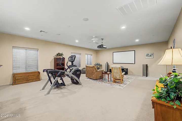 This flexible lower level is ideal for lively game-day parties, cozy movie nights, or welcoming long-term guests.
