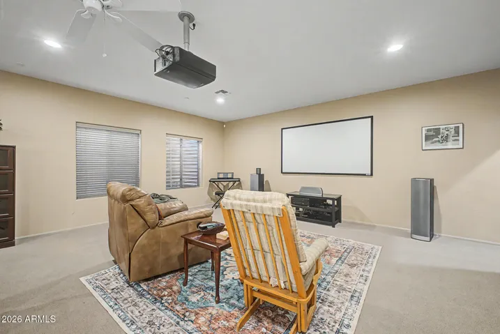 Ready-to-go Movie Projector setup with 92" Silver Screen and room for much more.