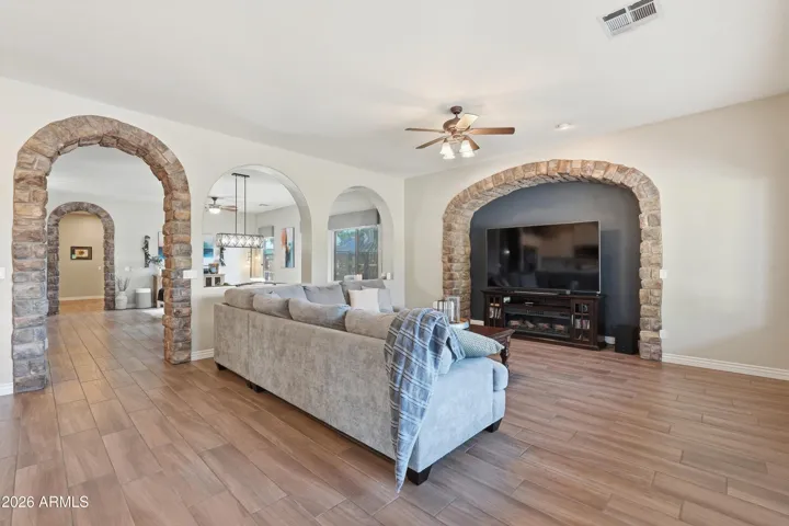 Family room with stone accents.