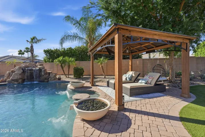 Gazebo features TV on 360 electric swivel for pool & lounge viewing.