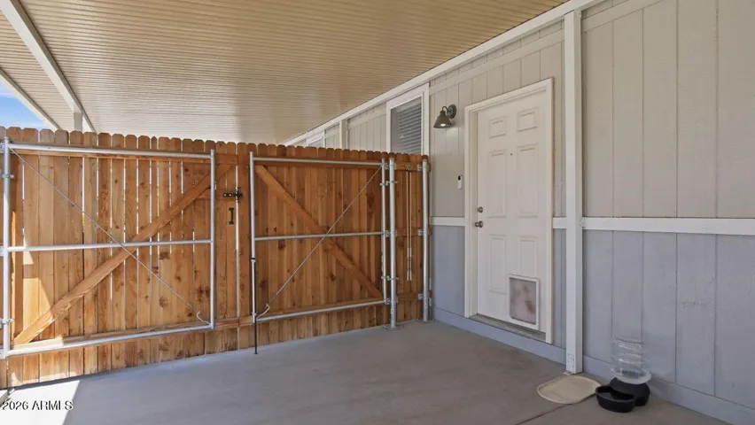 Side entrance with doggy door