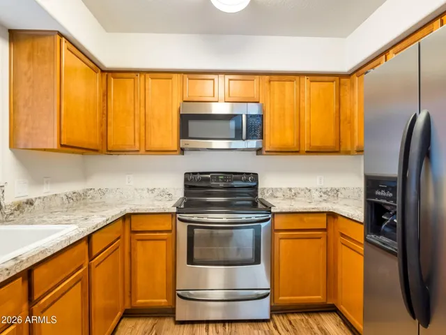 Kitchen with Stainless Steel and Granite Countertops