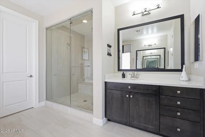 Large luxury shower and custom mirror