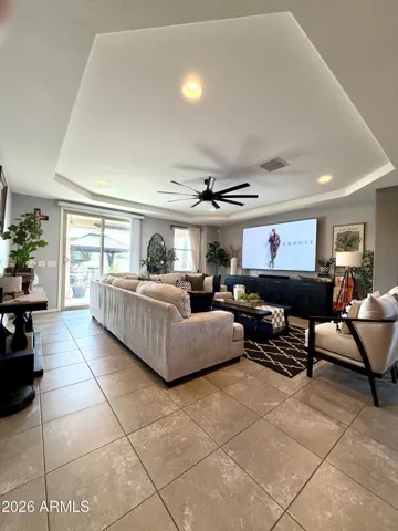 Inviting great room highlighted by a coffered ceiling