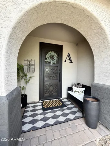 Elegant glass and iron security door