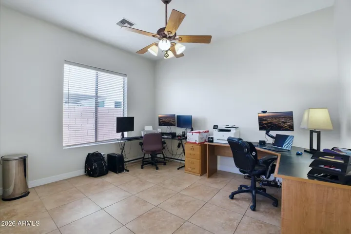 Separate bedroom on split floor plan with its own entry and exit doors, bathroom to side