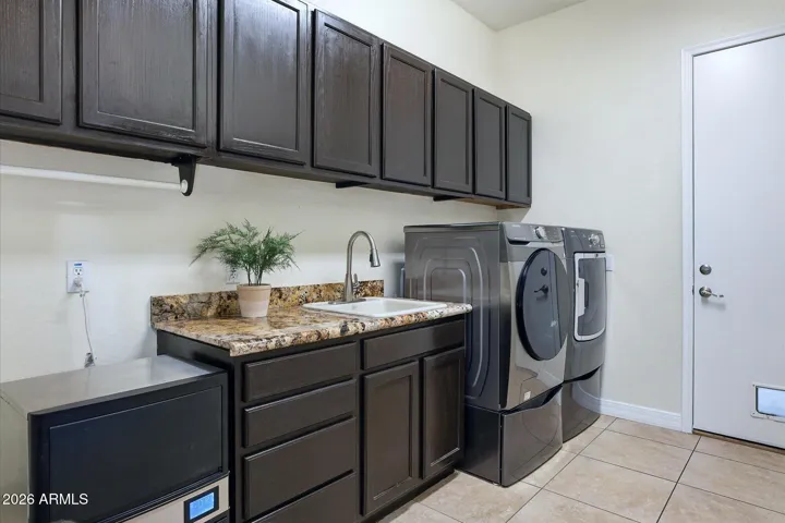 Washer and Dryer room with Ice Maker