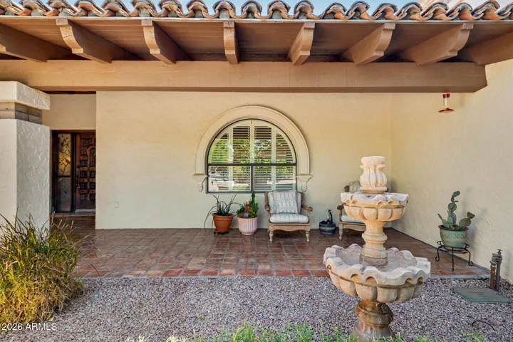 Front patio with wood beamed ceiling & Saltillo tile