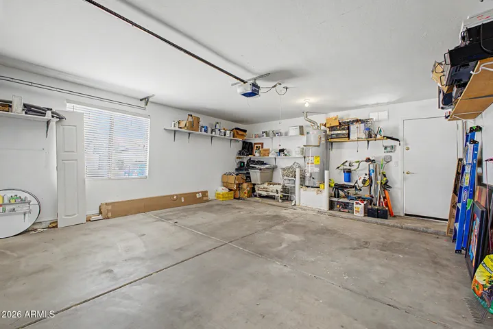 Garage with Gas hot water heater and whole home soft water system