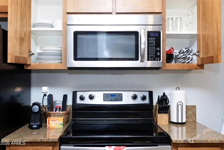 A real kitchen — fully stocked with dishes, cookware, and everything you need for home-cooked meals after a long shift or travel day."