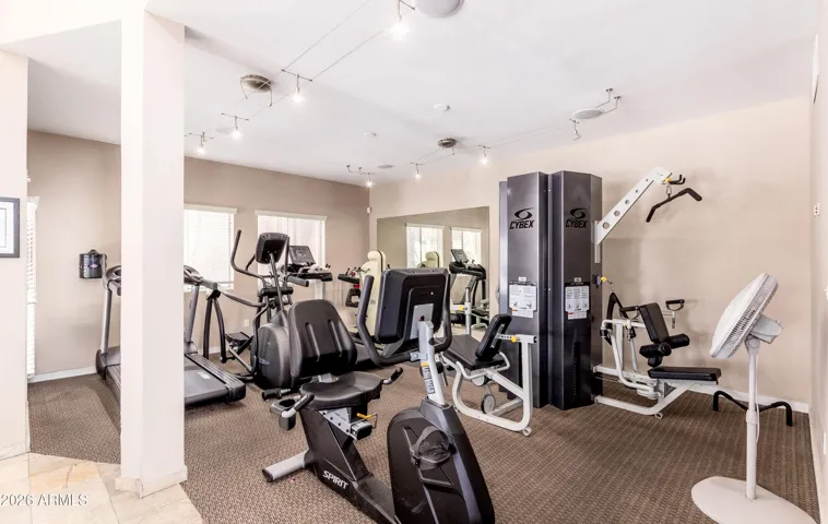 "Skip the gym membership — the on-site workout room has treadmills, ellipticals, Cybex strength machines, and cardio bikes. Everything a traveling nurse or corporate guest needs to stay on track."