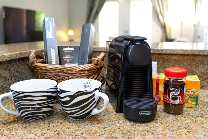 "Start every morning right — Nespresso machine, Lavazza & Starbucks pods, Nescafé, and herbal teas all waiting for you on arrival."