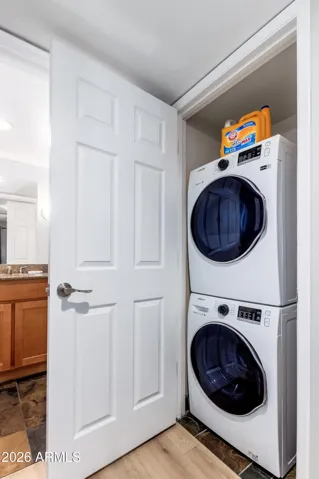 Samsung stackable washer & dryer in-unit. A must for long-term stays and traveling professionals."