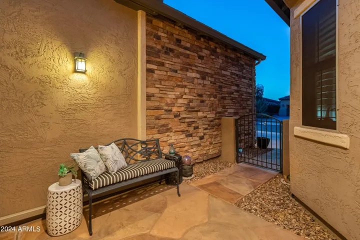 Welcome home as you enter into your beautiful courtyard through the wrought iron gate