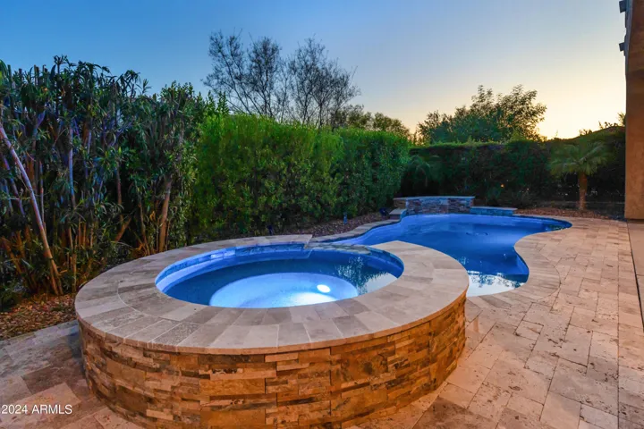Relax in your beautiful pool and spa