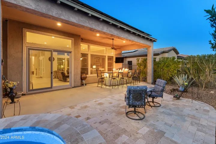 Enjoy your Arizona evenings under the extended covered patio with travertine pavers