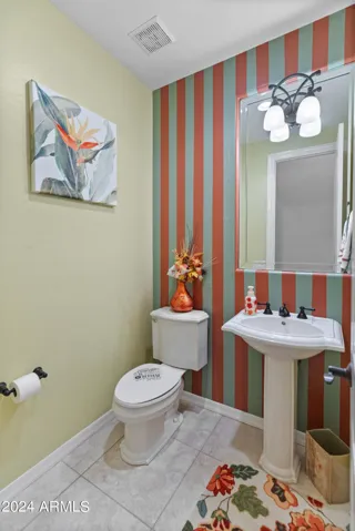 Conveniently located between kitchen and family room