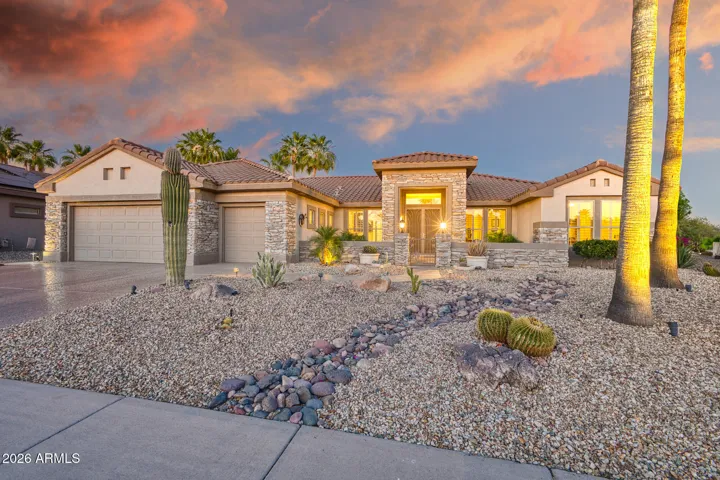 Stunning Mesquite model with expanded drive, 3 car garage and great curb appeal.