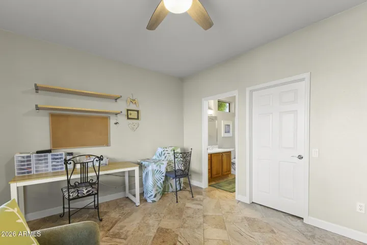 The ensuite bath provides privacy and convenience for guests.