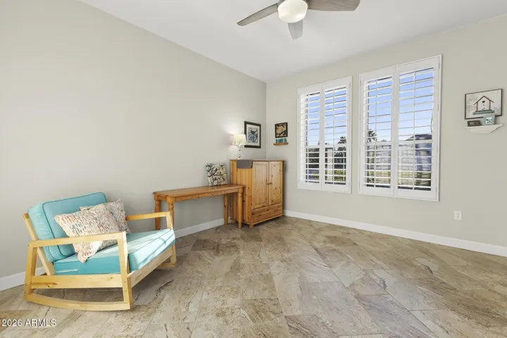 This angle of the spacious 3rd bedroom shows the large windows for plenty of light.