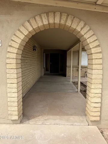 Welcome your friends and family through this beautiful entry and long front porch.