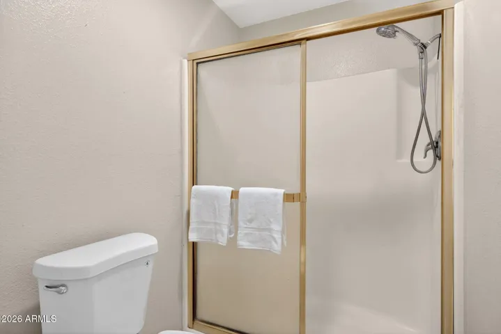 Private shower and toilet room with new toilet