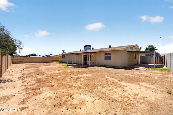Huge blank canvas ready for your design ideas. Also has additional covered patio of garage. Could be used for additional parking if RV gate was added.