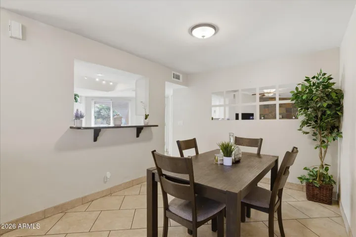 This window opens up the kitchen to the living space, allowing for a seamless flow of conversation while enjoying your living space.