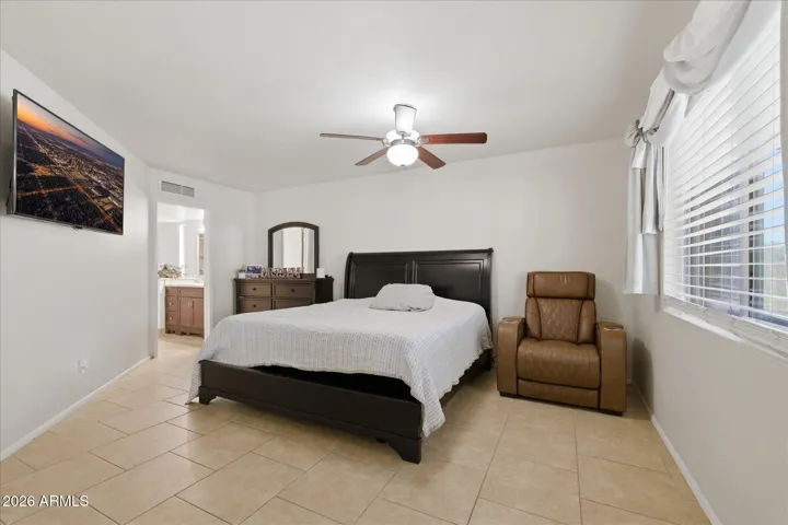 When it's time to relax, step into your primary retreat with plenty of space for a King bed and furniture galore.