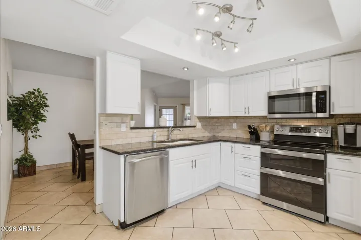 Featuring two pantries, a new oven with convection, built in microwave, and 2 yr old refrigerator, this is perfect for any cook!