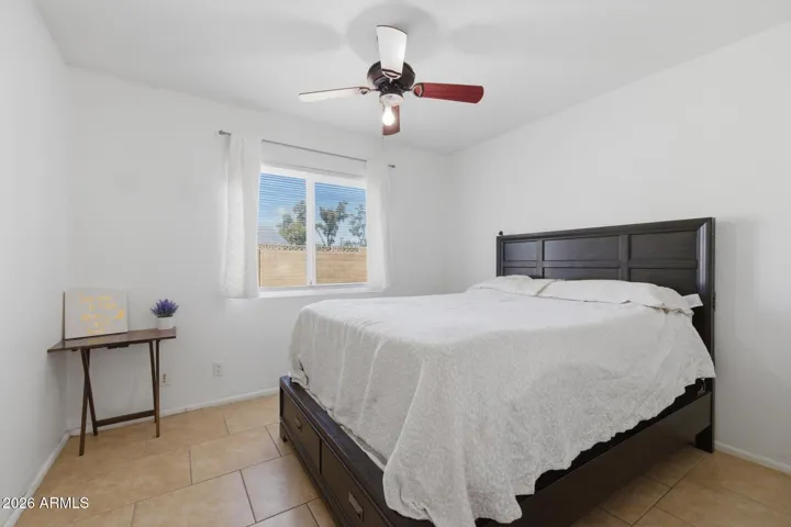 Look out onto your sparkling pool from the 3rd bedroom. Both bedrooms are separated by a hall bath giving everyone additional privacy with no shared walls!