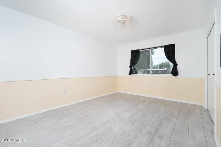BEDROOM WITH BLACK OUT CURTAINS FOR NAPPING.