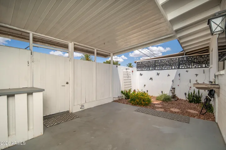 PRIVATE COVERED, FENCED REAR PATIO.