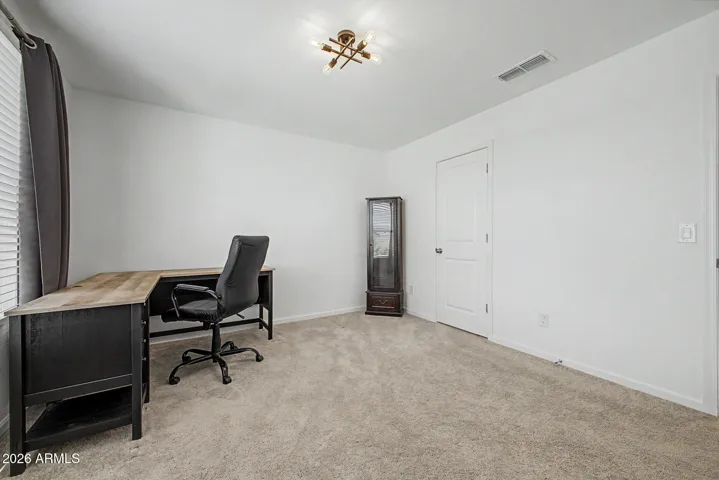 Good size bedroom with lighting