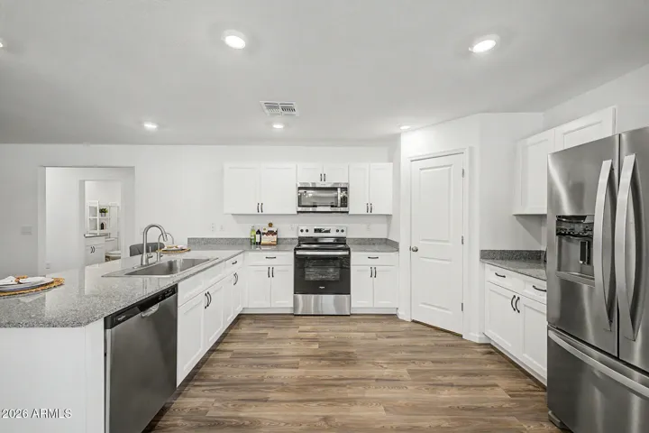 Lots of included features such as garbage disposal & Frig!