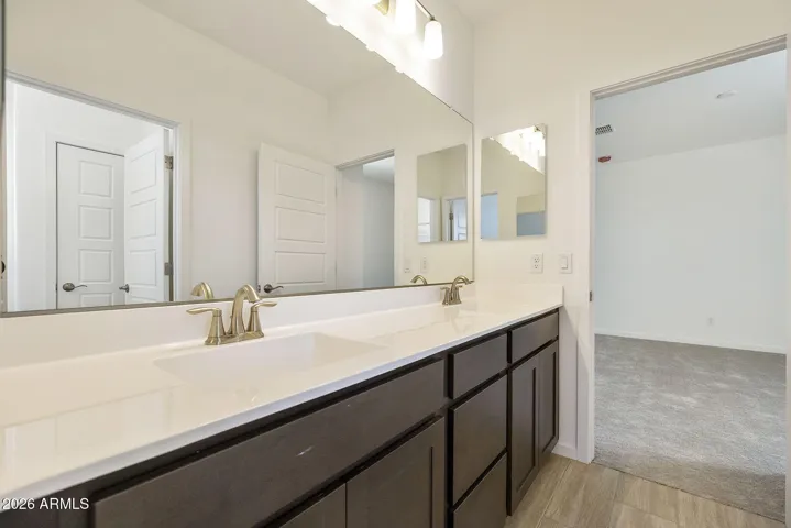 DOUBLE VANITIES AND SEPARATE TUB/SHOWER AND TOILET AREA