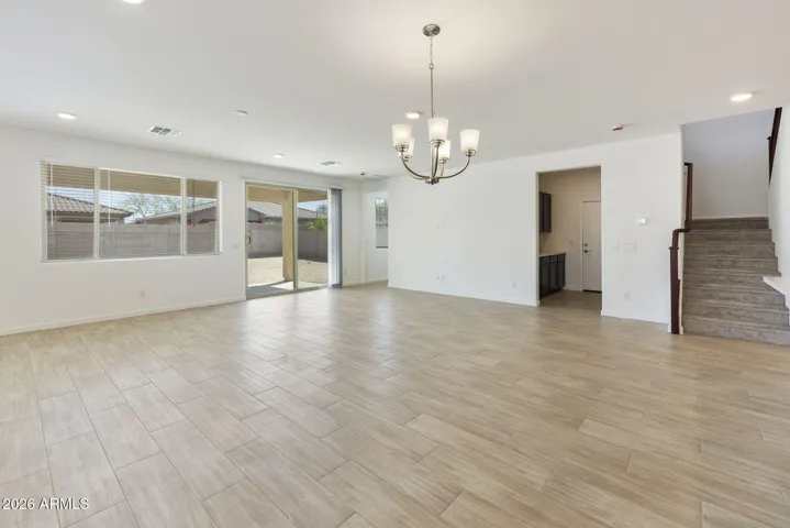 ALL OF THE BOTTOM FLOOR MINUS THE GUEST BEDROOM IS WOOD PLANK TILE!!!