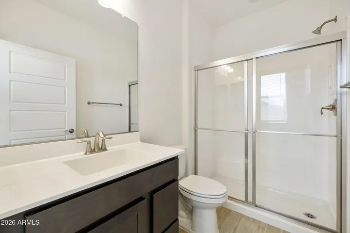 ON THE LOWER LEVEL THERE IS A GUEST SUITE AND FULL BATH