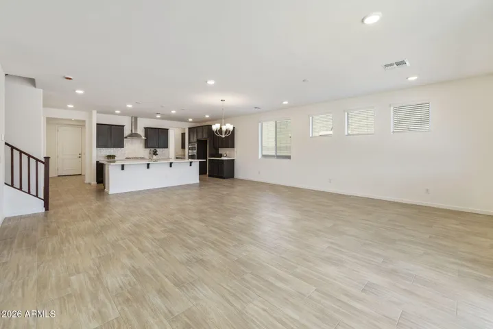 ALL OF THE BOTTOM FLOOR MINUS THE GUEST BEDROOM IS WOOD PLANK TILE!!!