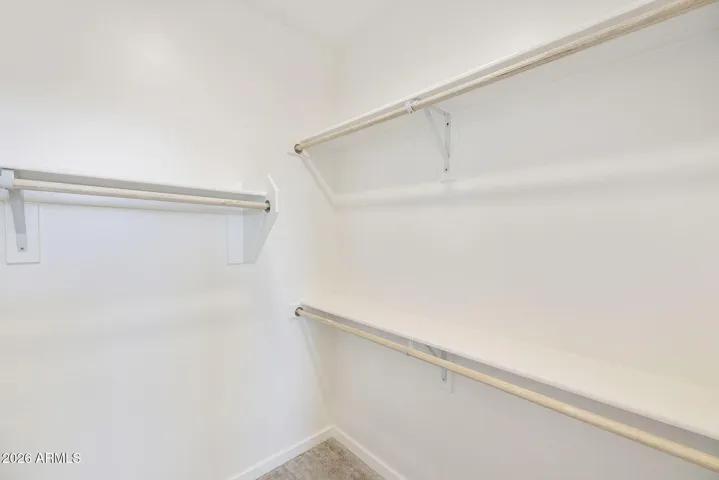 OWNER'S BATH HAS DUAL VANITIES, HIS AND HER CLOSETS, SEPARATE TUB AND SHOWER AND LOTS OF STORAGE!