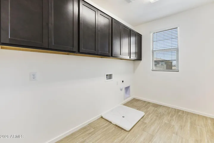 LAUNDRY HAS ALL UPPER CABINETS FOR EXTRA STORAGE