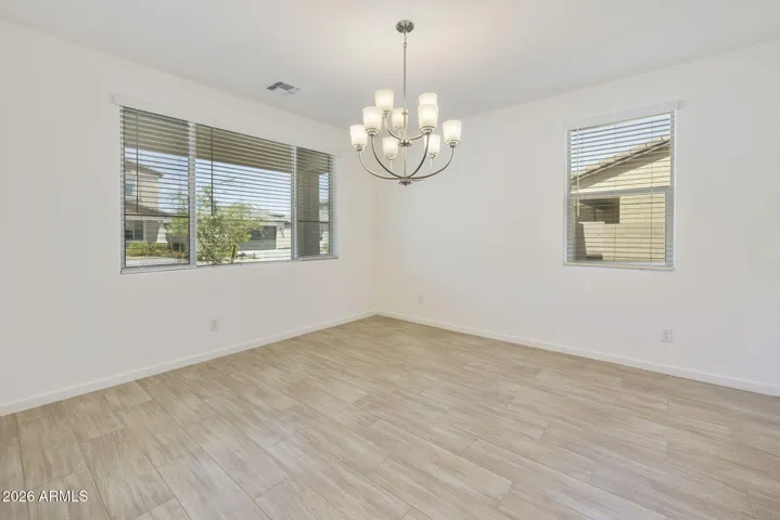 ALL OF THE BOTTOM FLOOR MINUS THE GUEST BEDROOM IS WOOD PLANK TILE!!!