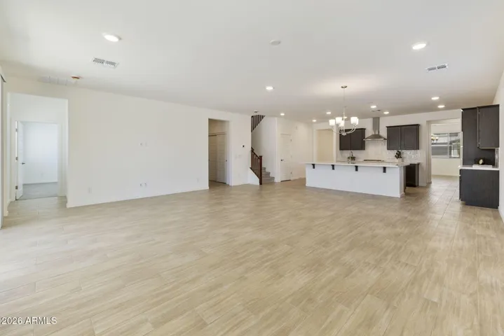 ALL OF THE BOTTOM FLOOR MINUS THE GUEST BEDROOM IS WOOD PLANK TILE!!!