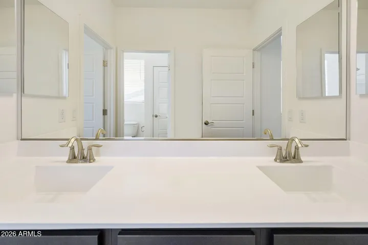 DOUBLE VANITIES AND SEPARATE TUB/SHOWER AND TOILET AREA