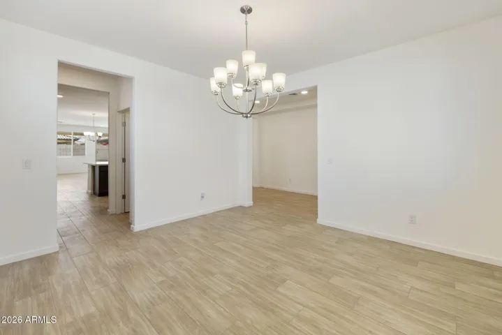 ALL OF THE BOTTOM FLOOR MINUS THE GUEST BEDROOM IS WOOD PLANK TILE!!!