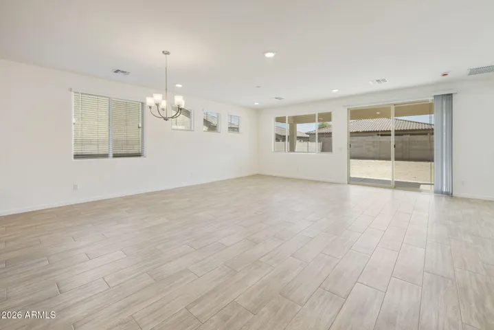 ALL OF THE BOTTOM FLOOR MINUS THE GUEST BEDROOM IS WOOD PLANK TILE!!!