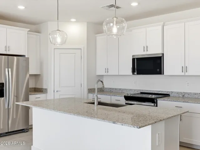 Photo is not of the actual home. Interior finishes and fixtures may vary.